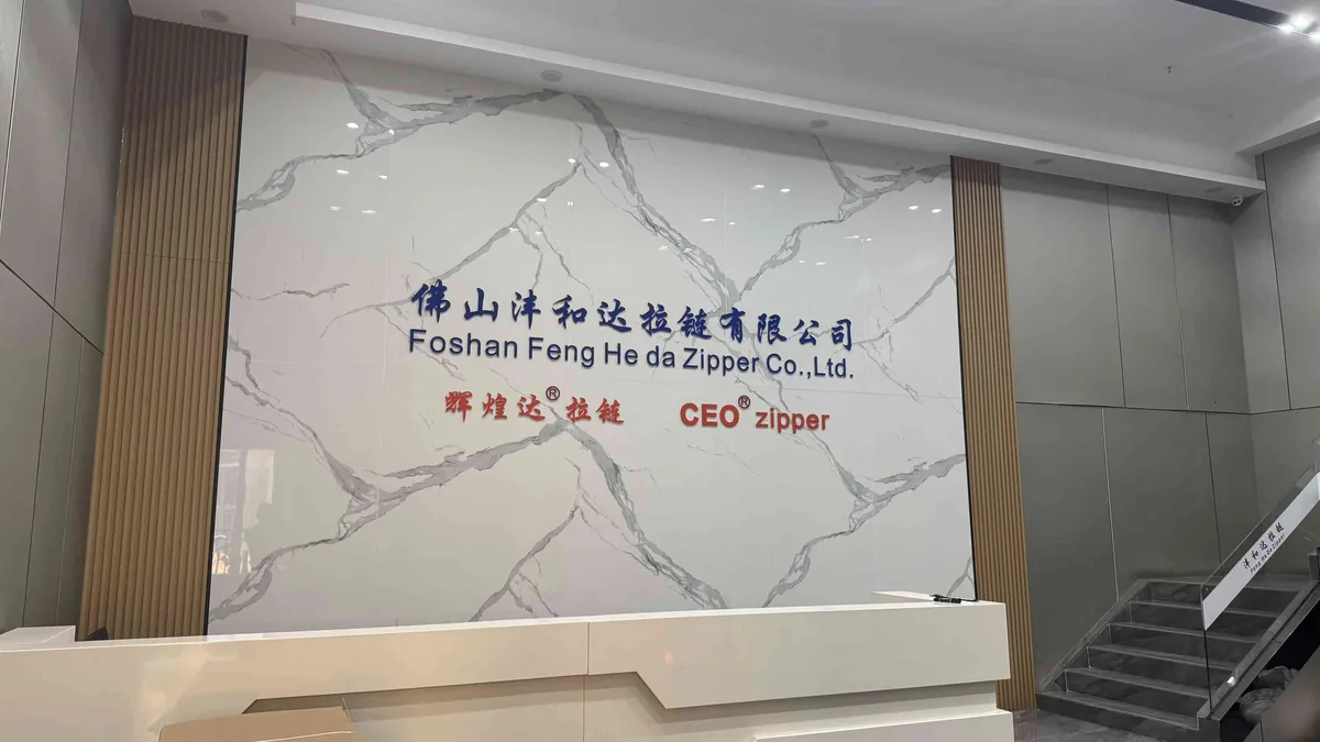 CEO Zipper reception wall showing company name Foshan Feng He da Zipper Co.,Ltd.